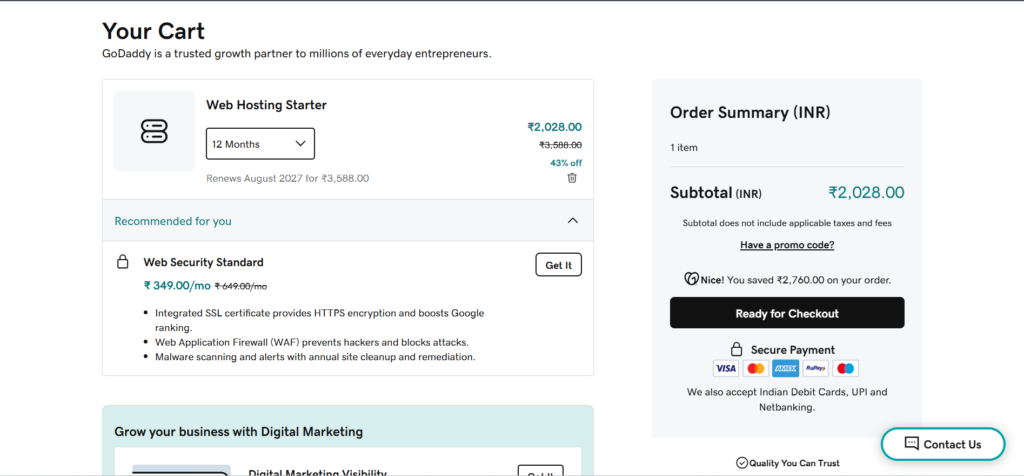 GoDaddy cart showing selected domain and hosting plan